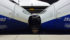Eiffelovercast #4 – Crossing France very very fast: a paean to TGVs The connection between two TGVs coupled together, cropped to suggest that the two trains are doing a French kiss