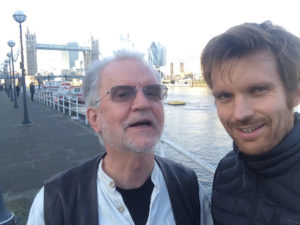 Image shows Søren Willert and Oliver Broadbent in London as they prepared training on Problem Based Learning for Engineers. They are standing by the Thames with Tower Bridge in the background